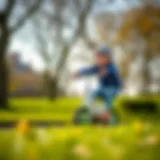 Child riding a balance bike in a park